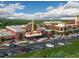 A mixed-use retail and entertainment district featuring The Eagle Theater with shopping, restaurants, and community spaces at 4037 Hill Station Ct, Sugar Hill, GA 30518