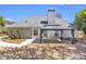 Well-maintained backyard with a patio, gazebo, and mature landscaping at 4090 Cherry Ridge Walk, Suwanee, GA 30024