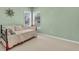 Bright bedroom with comfortable daybed and ample natural light at 4090 Cherry Ridge Walk, Suwanee, GA 30024