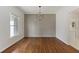 Dining room with hardwood floors and wainscoting at 517 Toombs St, Palmetto, GA 30268
