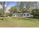 Well-manicured front lawn showcasing the home's exterior and landscaping at 517 Toombs St, Palmetto, GA 30268