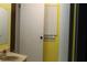 Modest bathroom featuring a toilet and a shower with a tan single sink at 1185 Highway 162, Covington, GA 30016