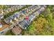 Aerial view of a residential neighborhood street and houses at 3897 Lake Sanctuary Way, Atlanta, GA 30349