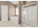 Bathroom featuring walk-in shower and soaking tub, with great natural light at 3897 Lake Sanctuary Way, Atlanta, GA 30349