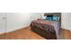 Cozy bedroom showcases neutral walls and a comfortable bed with decorative pillows at 3897 Lake Sanctuary Way, Atlanta, GA 30349