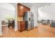 Open floor plan featuring kitchen, dining, and living room, great for entertaining at 3897 Lake Sanctuary Way, Atlanta, GA 30349