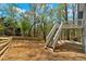 Spacious back yard with stairs leading to upper level deck at 4453 Autumn Glo Ct Ct, Douglasville, GA 30135