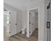 Ensuite bathroom featuring a large shower, toilet, and access to the walk in closet at 4453 Autumn Glo Ct Ct, Douglasville, GA 30135