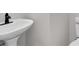 Bathroom sink and toilet with neutral paint and modern fixtures at 4453 Autumn Glo Ct Ct, Douglasville, GA 30135