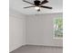 Bedroom with a ceiling fan, window view, and closet with bi-fold doors at 4453 Autumn Glo Ct Ct, Douglasville, GA 30135
