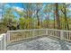 Decking surrounded by lush trees at 4453 Autumn Glo Ct Ct, Douglasville, GA 30135