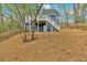 Exterior view of home showing fenced backyard and deck at 4453 Autumn Glo Ct Ct, Douglasville, GA 30135