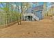 Exterior view of home showing deck and backyard at 4453 Autumn Glo Ct Ct, Douglasville, GA 30135