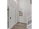 Hallway leading to rear entrance and stairwell at 4453 Autumn Glo Ct Ct, Douglasville, GA 30135