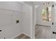 Bright Laundry room and view to another living space at 4453 Autumn Glo Ct Ct, Douglasville, GA 30135