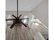 Aerial view of the living room with high ceilings, modern fan, natural light, and luxury vinyl flooring at 4453 Autumn Glo Ct Ct, Douglasville, GA 30135