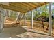 Covered patio with white columns and stairs to the back yard at 4453 Autumn Glo Ct Ct, Douglasville, GA 30135