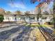 Charming single-story home featuring a cozy front porch and a beautifully paved stone driveway at 7440 Banks Mill Rd, Douglasville, GA 30135