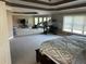 Large main bedroom features sitting area with fireplace and abundant natural light at 1210 Del Mar Club Dr, Dacula, GA 30019