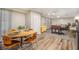 Finished basement features wood floors, dining area, and lounge with foosball table at 2810 Dunnington Cir, Chamblee, GA 30341