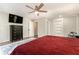 This bedroom boasts a ceiling fan and a large dresser, offering both comfort and storage at 2810 Dunnington Cir, Chamblee, GA 30341
