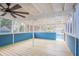Covered back porch adjacent to pool featuring a ceiling fan and tongue and groove ceiling and porch at 4809 Burlington Nw Ct, Acworth, GA 30102