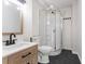 Bright bathroom showcasing a sleek vanity, modern fixtures, and a stand-up shower at 4809 Burlington Nw Ct, Acworth, GA 30102