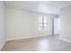 Cozy bedroom with a large window allowing plenty of natural light and a calming view at 4809 Burlington Nw Ct, Acworth, GA 30102