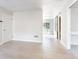 Bright living room featuring hardwood floors and access to a backyard patio through sliding glass doors at 4809 Burlington Nw Ct, Acworth, GA 30102