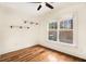 Cozy bedroom with hardwood floors and a window view at 559 Robinson Se Ave, Atlanta, GA 30315