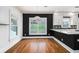 The dining room has hardwood floors and modern lighting fixture, perfect for intimate gatherings and everyday meals at 559 Robinson Se Ave, Atlanta, GA 30315
