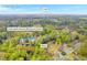 An aerial view highlights the home's location near Frank Lebby Stanton Elementary School and I-20, surrounded by lush trees at 111 Leathers Circle Nw, Atlanta, GA 30314