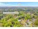 An aerial view highlights the home's location near Frank Lebby Stanton Elementary School and I-20, surrounded by lush trees at 111 Leathers Circle Nw, Atlanta, GA 30314