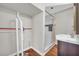 Modern bathroom with a vanity, and new shower with a marble tile surround at 111 Leathers Circle Nw, Atlanta, GA 30314