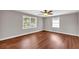 Spacious bedroom with hardwood floors, natural light, and neutral tones at 111 Leathers Circle Nw, Atlanta, GA 30314