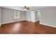 Bright bedroom with hardwood floors, ceiling fan and natural light from a window at 111 Leathers Circle Nw, Atlanta, GA 30314