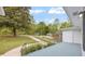 Covered front porch with black metal railings and view of the neighborhood at 111 Leathers Circle Nw, Atlanta, GA 30314