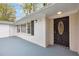 Front porch view with steel security door, and painted front porch flooring at 111 Leathers Circle Nw, Atlanta, GA 30314