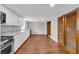 Modern kitchen with stainless steel appliances, granite counters, and ample cabinet space at 111 Leathers Circle Nw, Atlanta, GA 30314