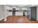 Spacious kitchen with white cabinets, stainless steel appliances, and a stylish backsplash at 111 Leathers Circle Nw, Atlanta, GA 30314