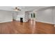 Cozy living room with hardwood floors, fireplace, and ceiling fan at 111 Leathers Circle Nw, Atlanta, GA 30314