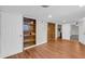 View of the living room with shelving, closet, and access to the kitchen at 111 Leathers Circle Nw, Atlanta, GA 30314