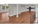 Open concept living room and kitchen with hardwood floors and neutral colors at 111 Leathers Circle Nw, Atlanta, GA 30314