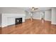 Inviting living room with beautiful hardwood floors and stylish fireplace at 111 Leathers Circle Nw, Atlanta, GA 30314