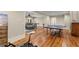 Finished basement featuring hardwood floors, a living area, and a ping pong table for entertainment at 208 Greenhill Dr, Dallas, GA 30157