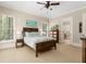 Comfortable main bedroom with wood furnishings, neutral tones, and ample natural light at 208 Greenhill Dr, Dallas, GA 30157