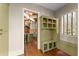 Well-organized mud room with built-in storage and convenient access to the kitchen at 208 Greenhill Dr, Dallas, GA 30157
