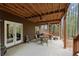 Covered patio area with outdoor furniture, perfect for entertaining and relaxing at 208 Greenhill Dr, Dallas, GA 30157