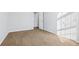 Bedroom featuring neutral paint, carpet, and a double door closet at 277 Edison Dr, Stockbridge, GA 30281