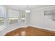 Bright breakfast nook featuring hardwood floors, large windows, and modern lighting at 277 Edison Dr, Stockbridge, GA 30281